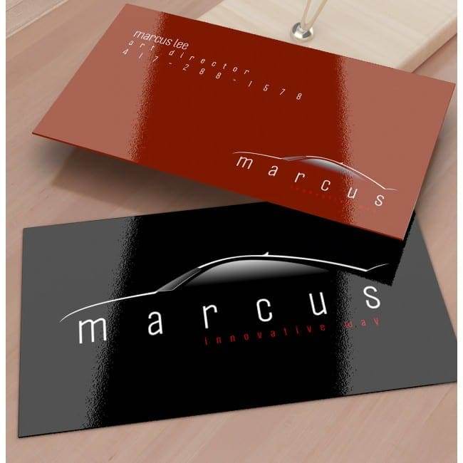 Red and black glossy business cards showing a finished card stock